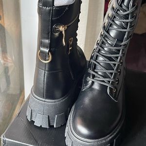 Brand new combat boots with gold zipper detailing and side zipper for easy wear